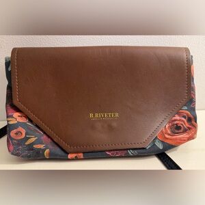 R. Riveter brown leather and floral canvas crossbody bag.
